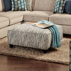 Caledonia Transitional Ivory Chenille Upholstered Cocktail Ottoman by Furniture of America