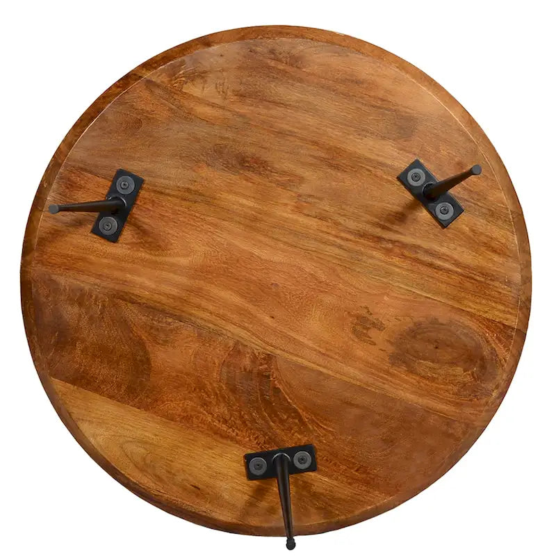 Table basse ronde en bois de manguier brun et noir avec pieds métalliques évasés